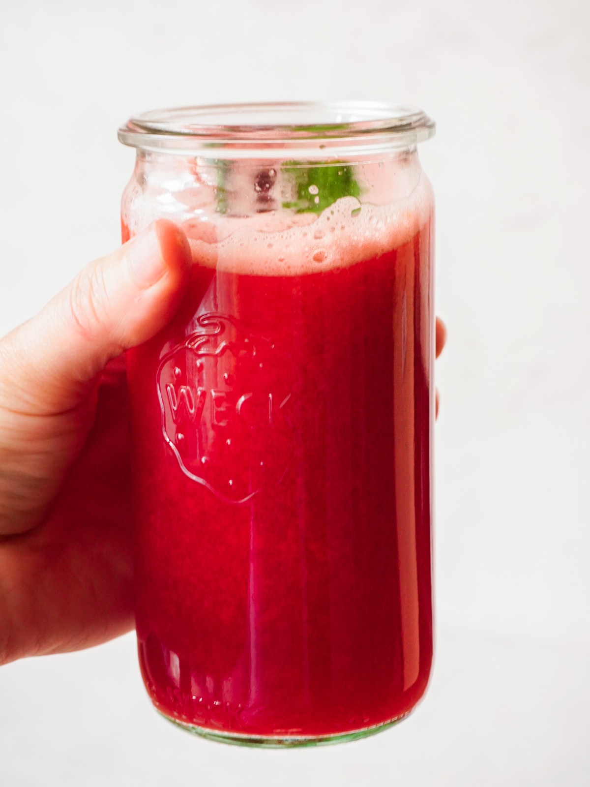 A tall glass of Pomegranate Juice